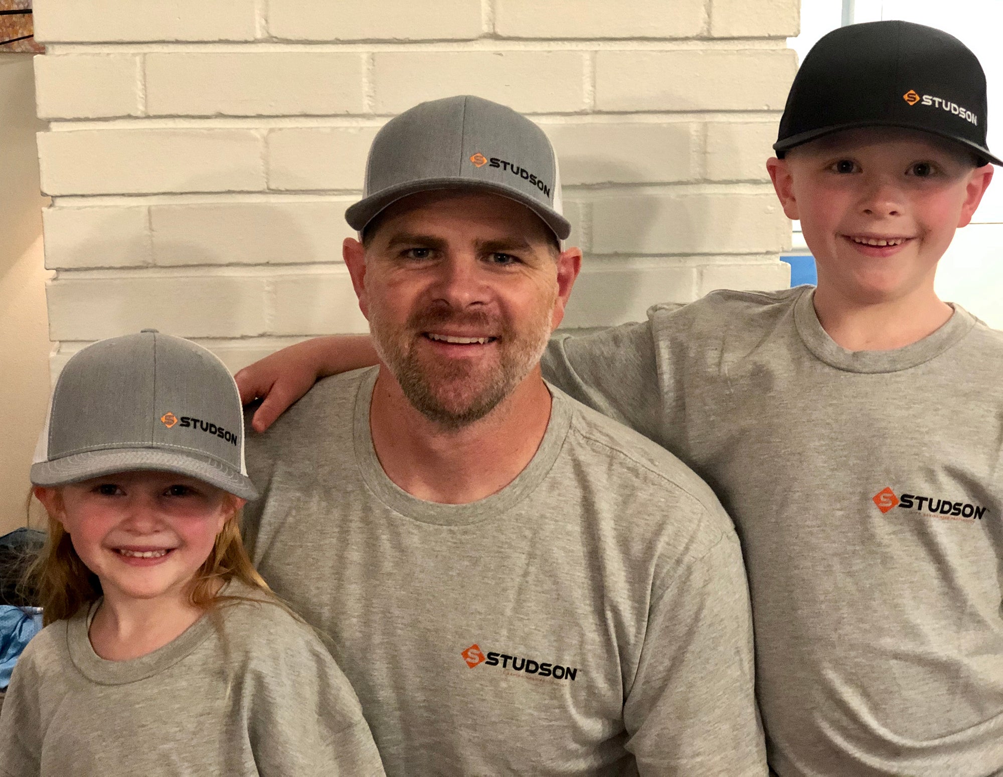 Ryan Barnes founder of STUDSON industrial head protection safety company with his children who inspired the name STUDSON.