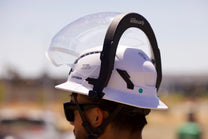 a man wearing a helmet and sunglasses