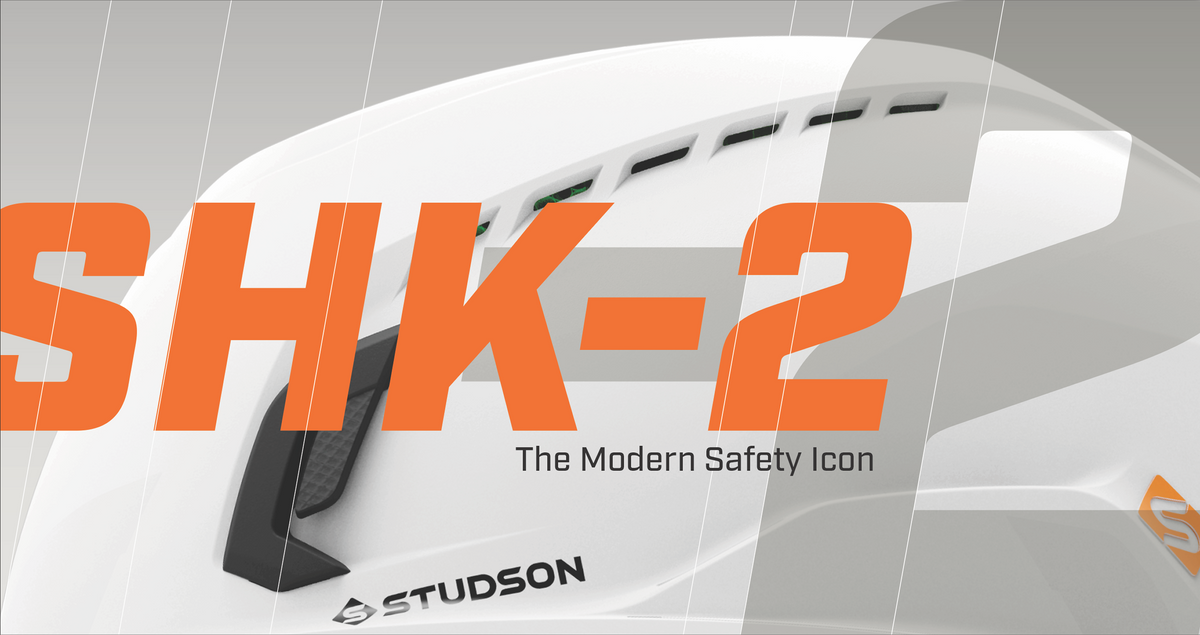 a white helmet with orange text